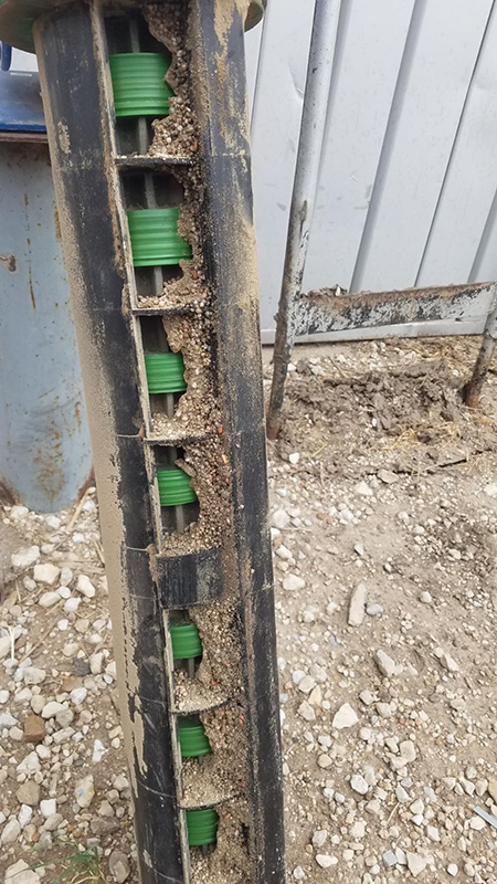 Close up look inside of an Intelligent Ag system with a blockage.