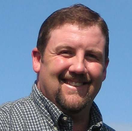 Headshot of Tom Cannon.