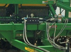 UniForce Hydraulic Downpressure valve block on a John Deere drill.