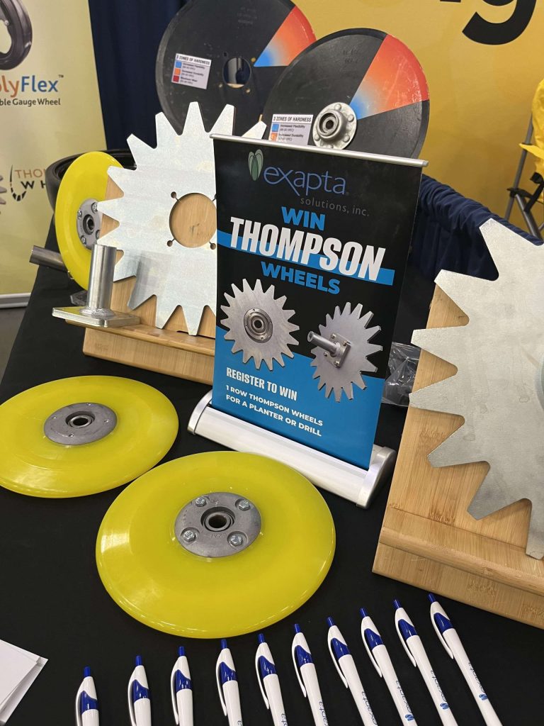Poster for winning Thompson Closing Wheels giveaway on a table of parts.