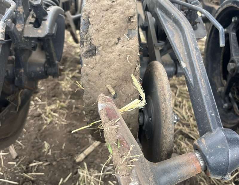Closing system covered in mud because of wet conditions.